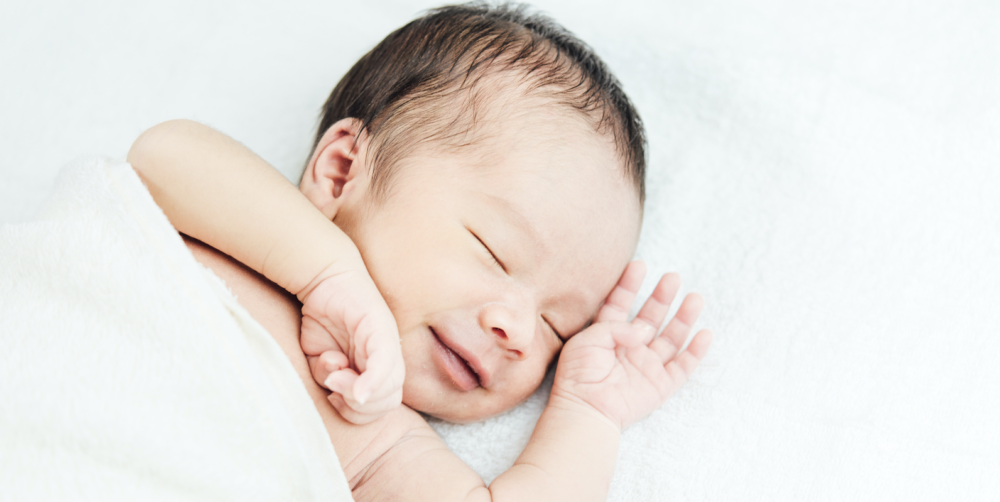 Pourquoi les nouveau-nés sourient-ils en dormant ? (©Shutterstock/316pixel)